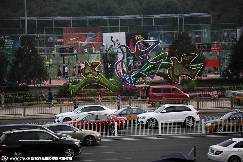 Canteiros de flores no centro de Beijing para celebrar aniversário da vitória contra agress?o japonesa