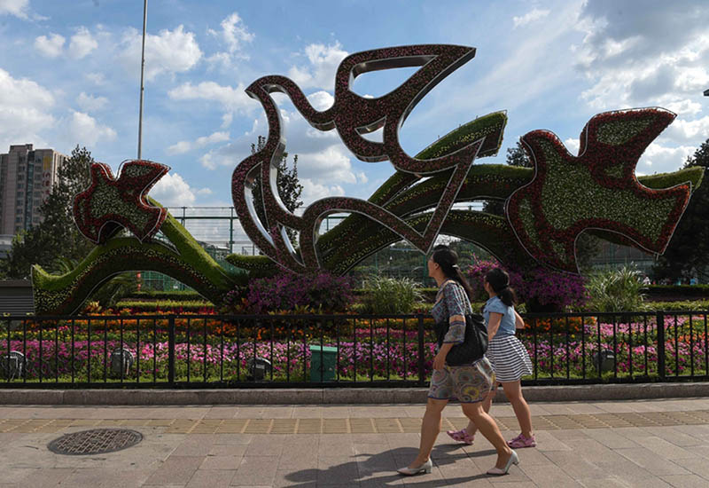 Réplica floral da Grande Muralha na Pra?a Tiananmen