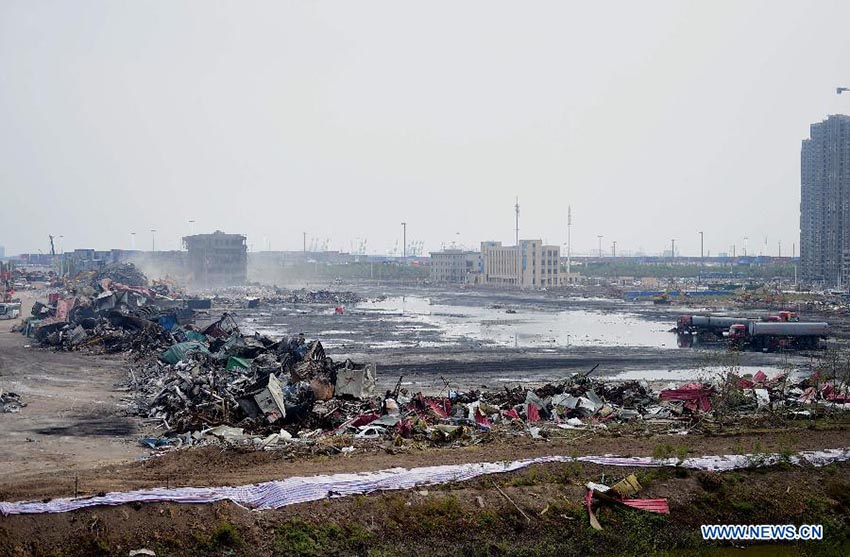 Número de mortos na explos?o do Porto de Tianjin sobe para 150