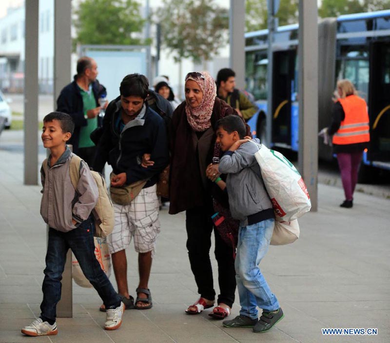 Milhares de refugiados chegam à esta??o central de Munique