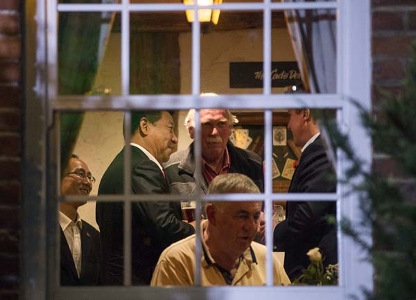 Cameron convida presidente chinês para cerveja com peixe e batatas fritas num pub