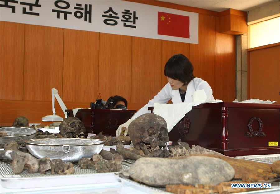 Restos mortais de soldados chineses mortos na Guerra da Coreia transladados para a China