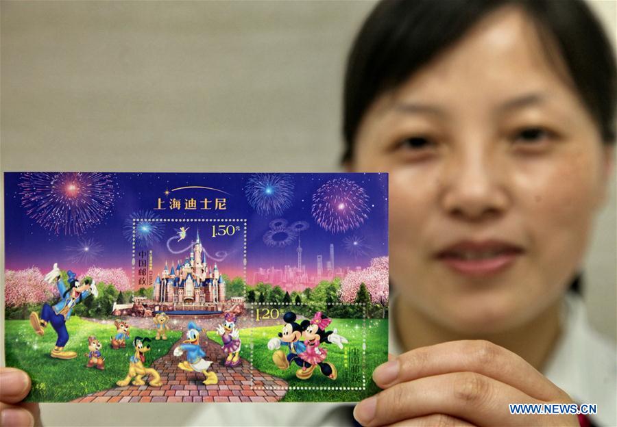 Correios da China lan?a selos com estampas da Disney Shanghai
