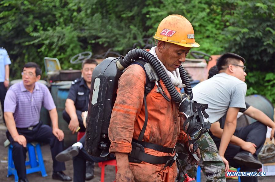 Incêndio em mina de carv?o aprisiona 13 mineiros no nordeste da China