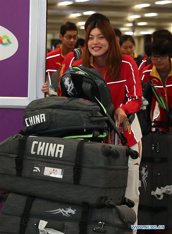 Equipe de nata??o da China chega ao Rio