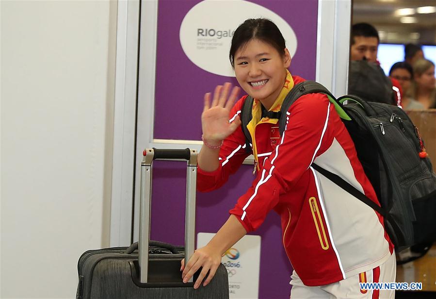 Equipe de nata??o da China chega ao Rio