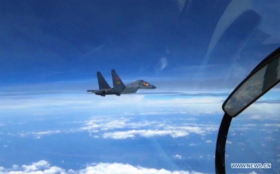 For?a Aérea chinesa realiza patrulha no Mar do Sul da China