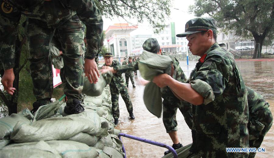 Forte chuva tira milhares de casa após tuf?o no nordeste da China