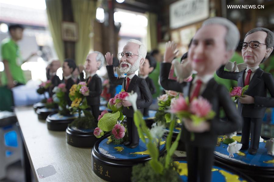 Figuras de barro que caracterizam líderes da Cúpula do G20 em exposi??o em Hangzhou