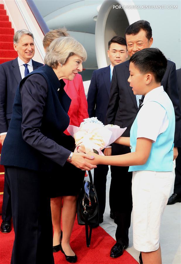 Primeira-ministra britanica chega à China para cúpula do G20