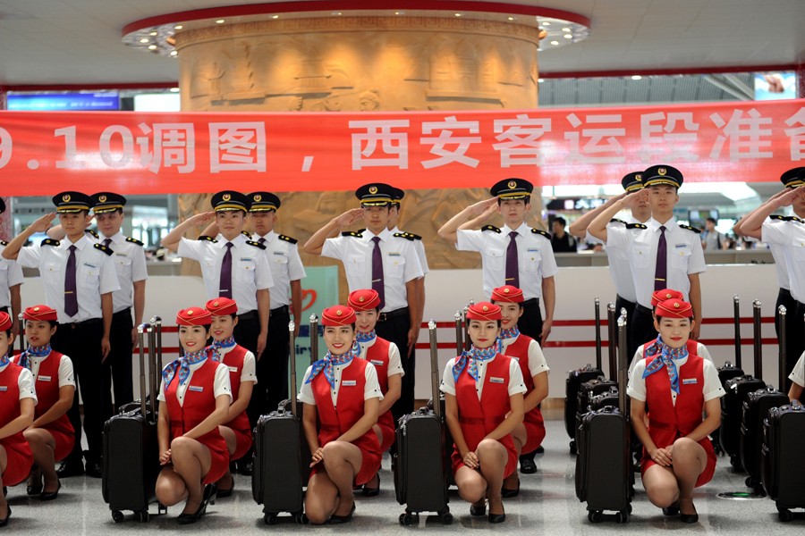 Funcionários de trem-bala estream nova imagem em Xi'an