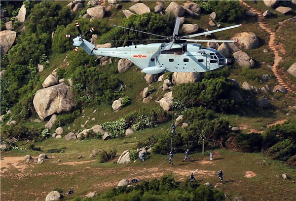 Exercício militar sino-russo termina com miss?o de ocupa??o de ilha