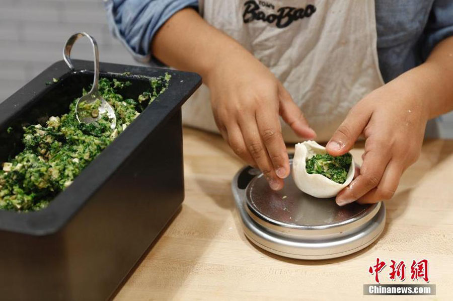 Loja de “baozi” ganha popularidade na Pra?a de Harvard