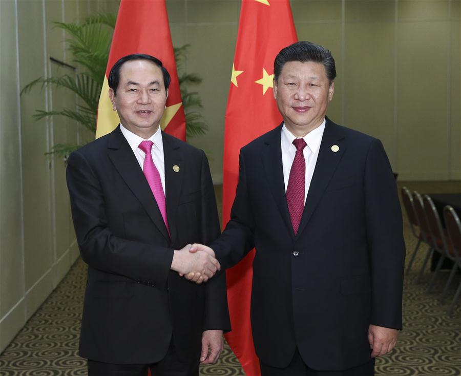 China apoia Vietn? na organiza??o de reuni?es de APEC em 2017, diz presidente chinês