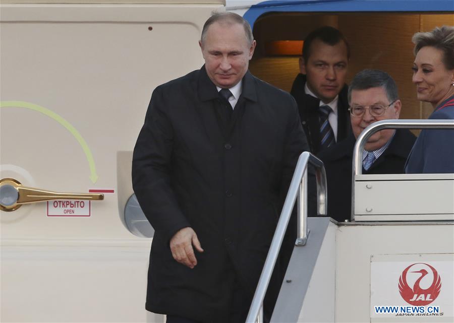 Putin e Abe reunidos para debater disputa territorial e coopera??o econ?mica