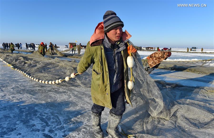 época de pesca de inverno iniciada com celebra??es no nordeste da China