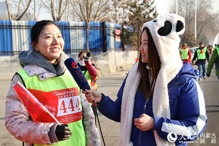 Diário do Povo Online organiza caminhada em comemora??o do seu 20o aniversário em Hohhot
