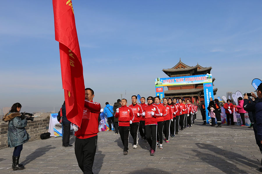 Diário do Povo Online organiza caminhada em comemora??o do seu 20o aniversário em Datong