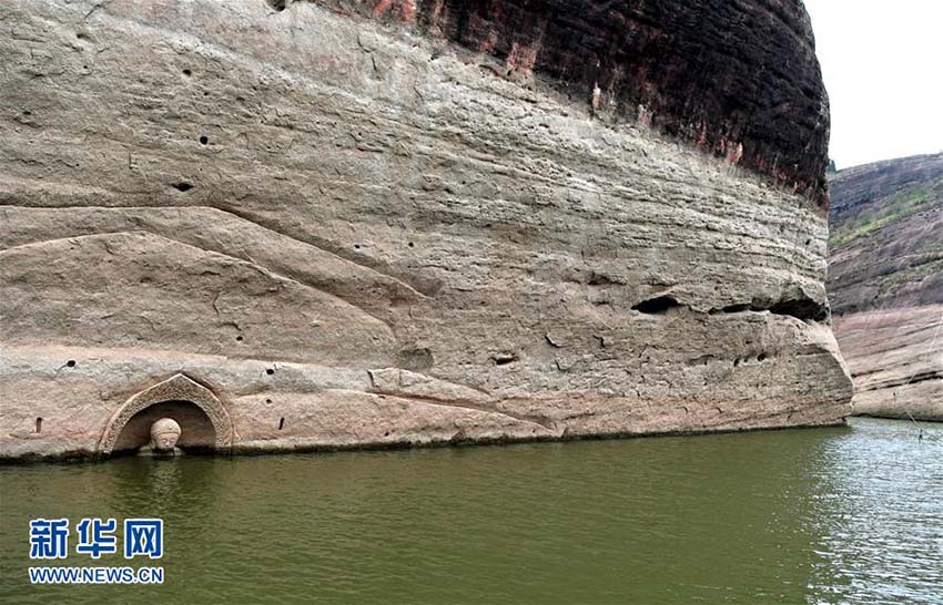 Província de Jiangxi: Buda antigo descoberto em reservatório após redu??o do nível de água