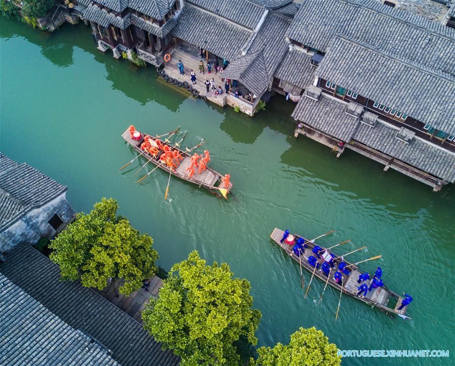 Competi??o de barco em Hangzhou celebra o Festival Sanyuesan