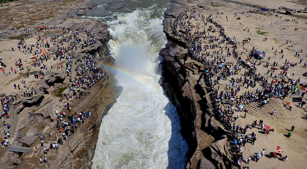 China totaliza descola??o de 134 milh?es de turistas no feriado do Dia dos Trabalhadores