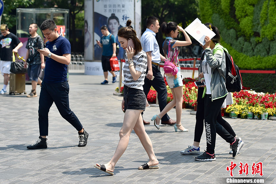 Termómetros sobem acima dos 35aC em Beijing