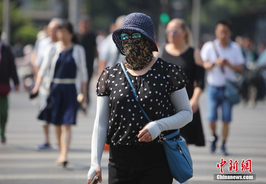 Termómetros sobem acima dos 35aC em Beijing