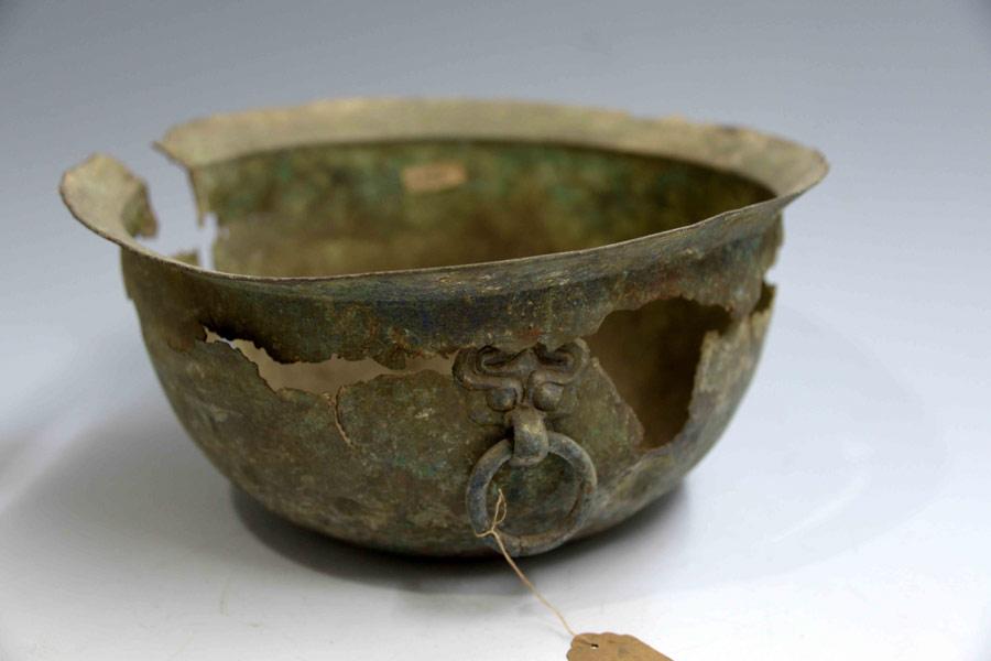 Restaura??o de utensílios de bronze em destaque em Wuhan