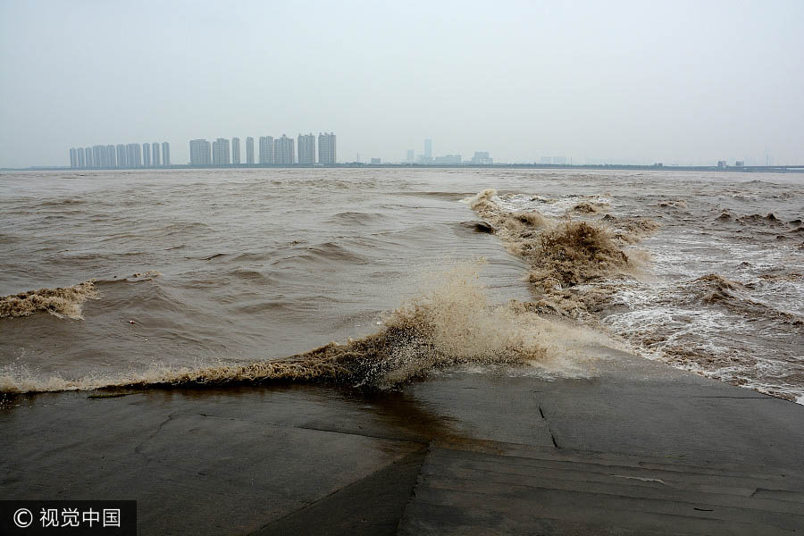 Galeria: Mará alta sazonal do rio Qianjiang 