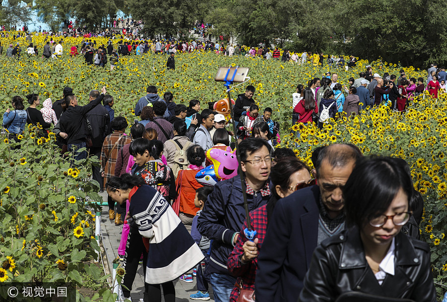 China registra 705 milh?es de viagens durante feriad?o