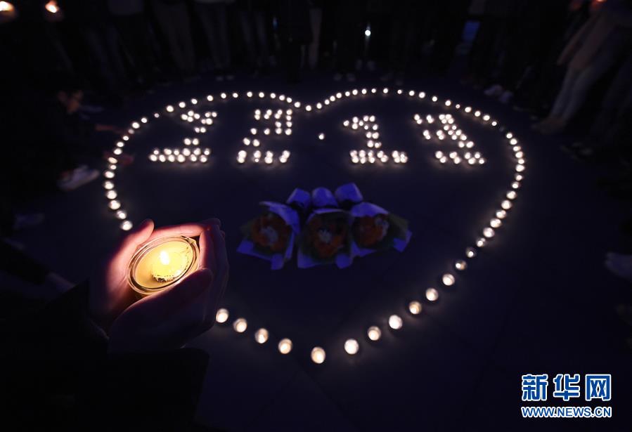 Estudantes universitários realizam atividades em memória do Massacre de Nanjing