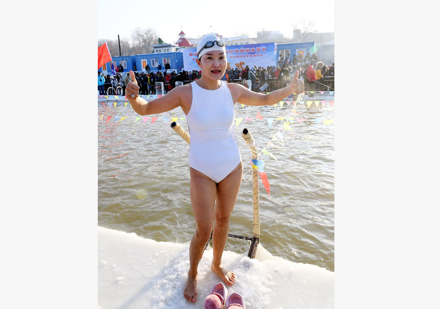 600 Entusiastas da nata??o competem em temperaturas de 20 graus negativos