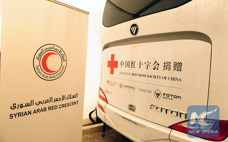 Cruz Vermelha da China doa clínicas móveis e ambulancias para Síria
