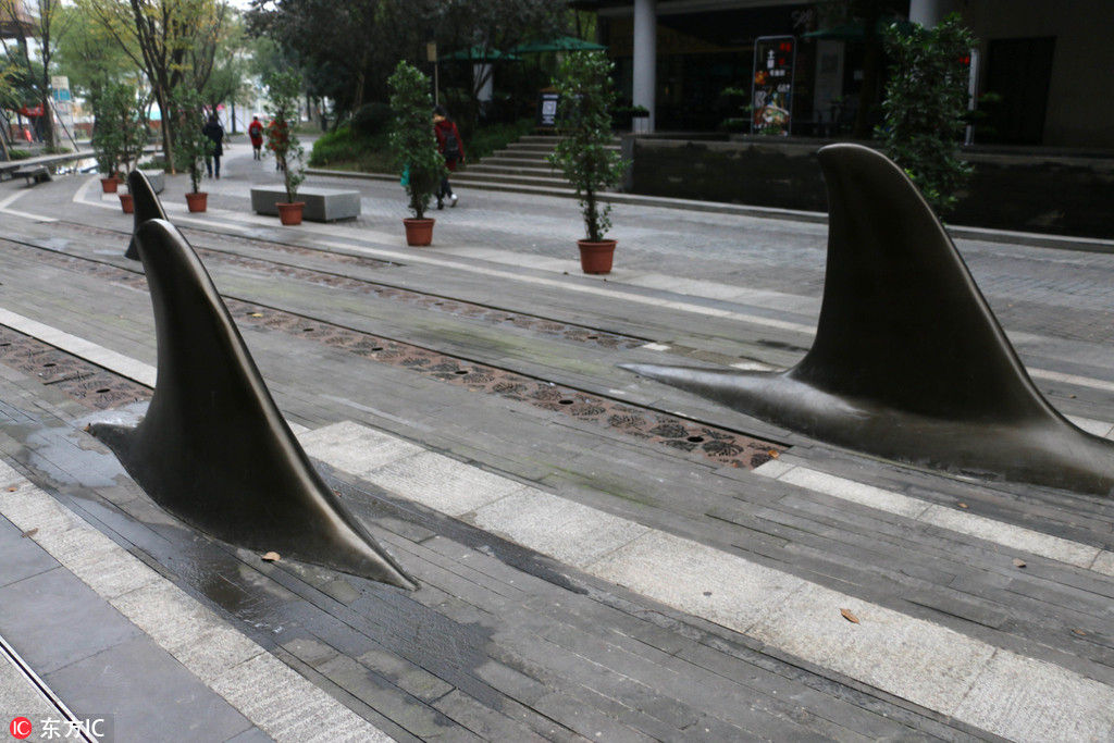 Chongqing estabelece cones de sinaliza??o rodoviária em forma de barbatana de tubar?o