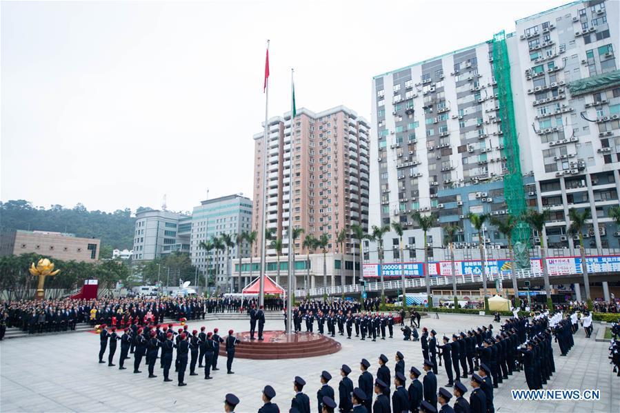 Cerim?nia de hasteamento de bandeiras celebra o 19.o aniversário do regresso de Macau à pátria