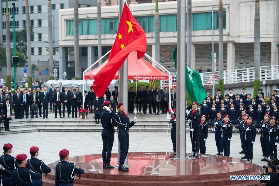 Cerim?nia de hasteamento de bandeiras celebra o 19.o aniversário do regresso de Macau à pátria