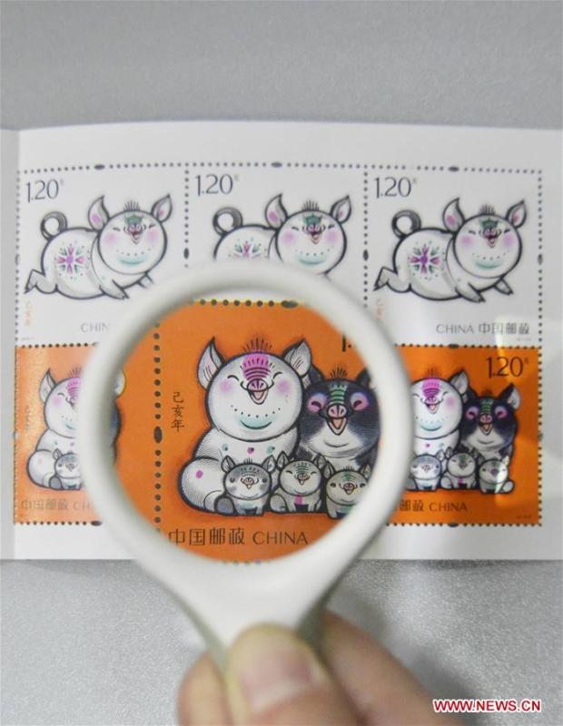 China lan?ou os selos especiais do zodíaco de homenagem ao Ano do Porco