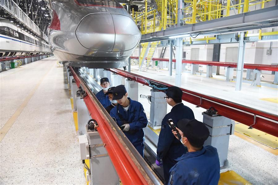 Trens-bala Fuxing recebem manuten??o regular em Shandong, leste da China