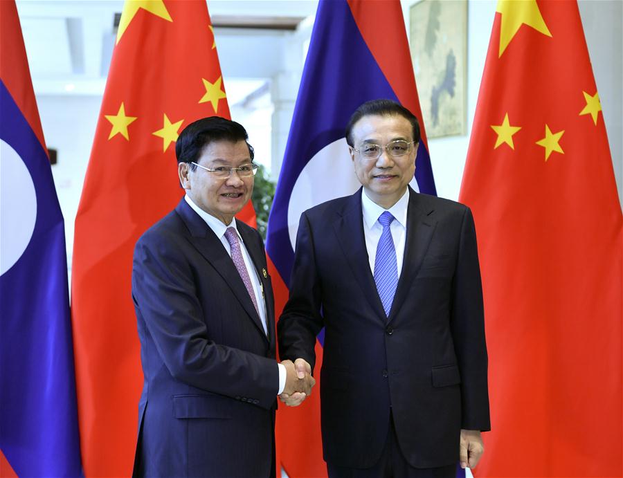 China e Laos prometem fortalecer la?os econ?micos