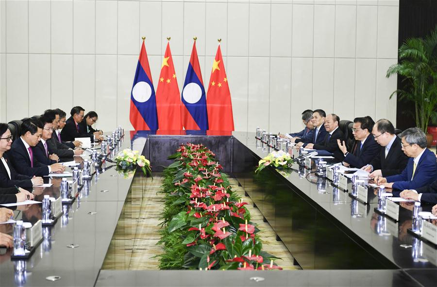 China e Laos prometem fortalecer la?os econ?micos