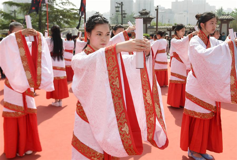 Estudantes participam de cerim?nia de amadurecimento em Xi'an