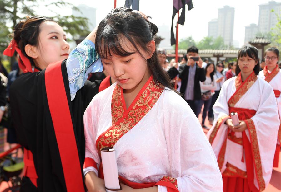 Estudantes participam de cerim?nia de amadurecimento em Xi'an