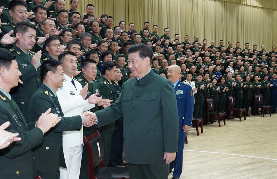 Xi reúne-se com delegados do congresso do Partido da for?a conjunta de apoio logístico e altos oficiais do ELP em Hubei
