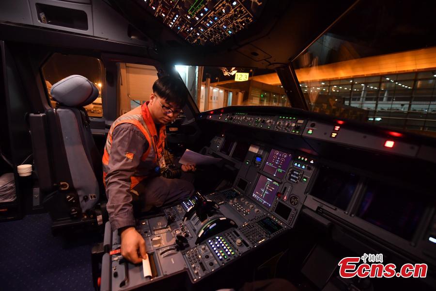 Companhia aérea realiza manuten??o de avi?es para garantir seguran?a do chunyun 