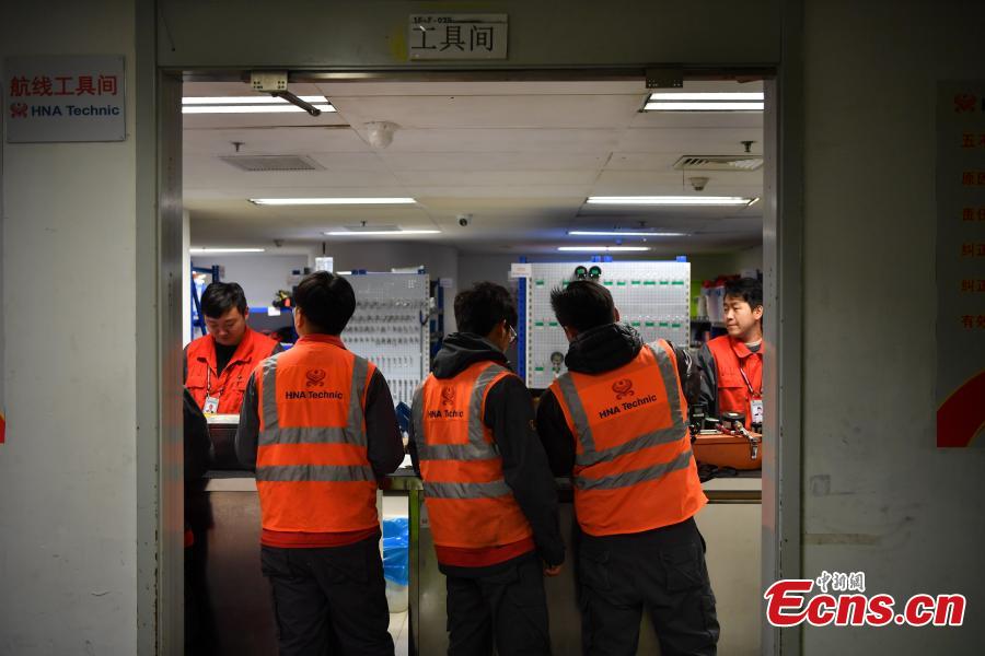 Companhia aérea realiza manuten??o de avi?es para garantir seguran?a do chunyun 