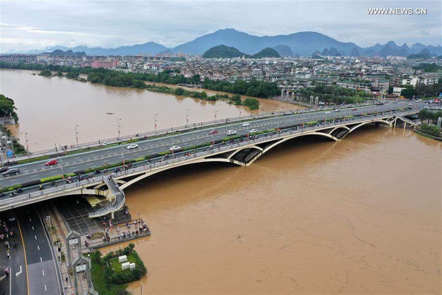 Mais de 2,6 milh?es de pessoas afetadas por inunda??es no sul da China

