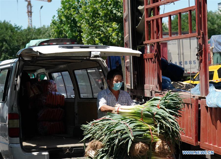 Beijing designa locais provisórios para venda de legumes após suspens?o do mercado atacadista de Xinfadi