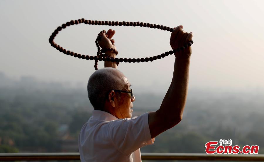 Beijing: parques registram maior afluência de visitantes com a diminui??o do nível de emergência 
