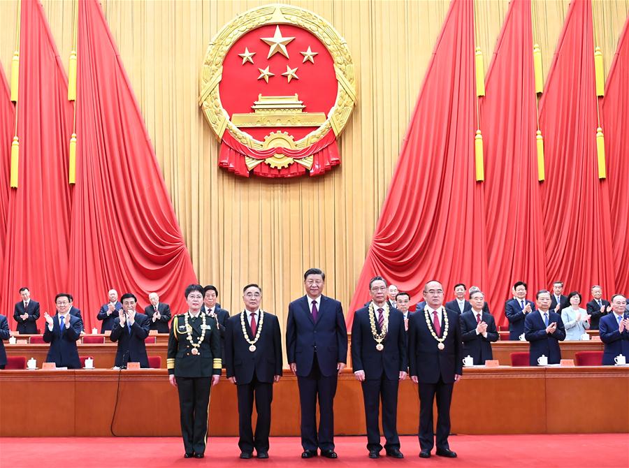 China realiza reuni?o para homenagear exemplos na luta contra COVID-19