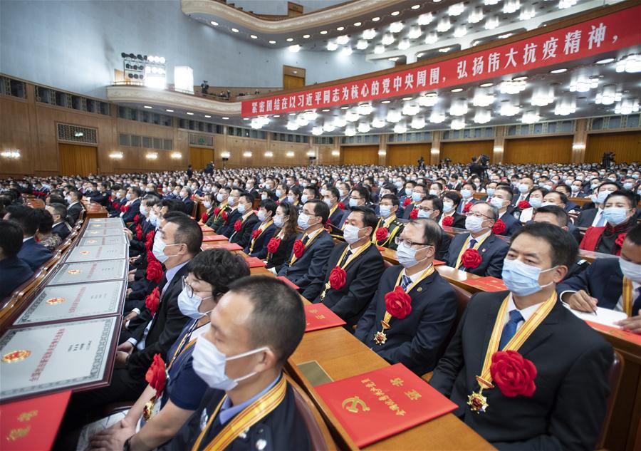 China realiza reuni?o para homenagear exemplos na luta contra COVID-19